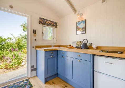 The shepherd's hut kitchen at The Smithy, Feock