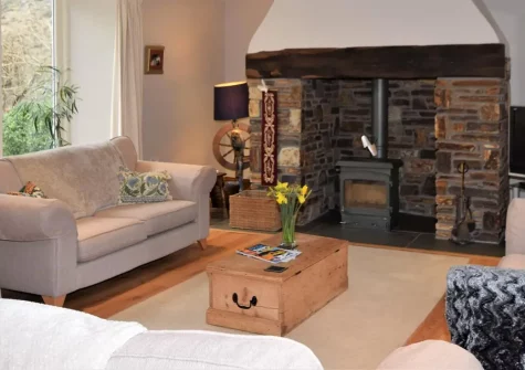 The Stables, Lynton is a stunning four-bedroom stone barn conversion, boasting a cosy inglenook log burner, an enclosed dog-friendly courtyard garden, and superb access to both Exmoor National Park and the spectacular North Devon coast.