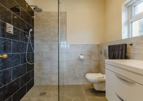 The shower room at The Stone Barn at Hock Ridge Farm, Fairy Cross