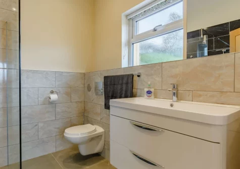 The shower room at The Stone Barn at Hock Ridge Farm, Fairy Cross