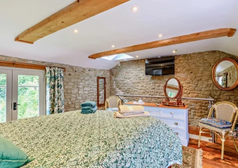 The bedroom at The Stone Barn, Dulford