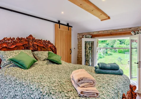 The bedroom at The Stone Barn, Dulford