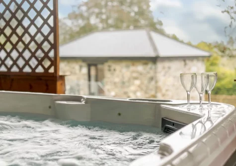 The private covered hot tub at The Swallows Barn, Bray Shop
