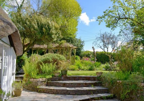 The patio & garden at The Thatch Cottage, South Petherwin