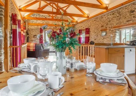 The dining area at The Threshing Barn at Cusgarne Cottages, Cusgarne