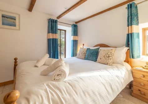 Bedroom #1 at The Threshing Barn at Cusgarne Cottages, Cusgarne