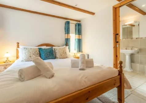 Bedroom #1 at The Threshing Barn at Cusgarne Cottages, Cusgarne