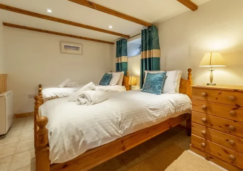 Bedroom #1 at The Threshing Barn at Cusgarne Cottages, Cusgarne