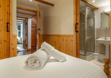 Bedroom #1 at The Threshing Barn at Cusgarne Cottages, Cusgarne
