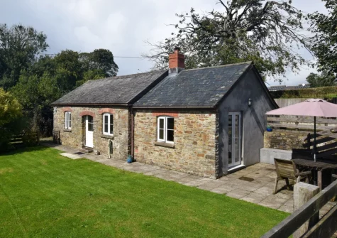 The patio, alfresco dining area & enclosed garden at The Trappings, Langtree
