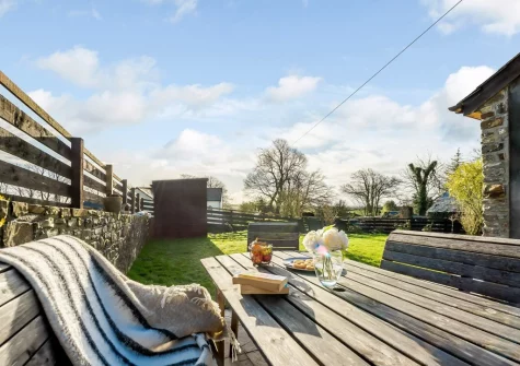 The patio, alfresco dining area & garden at The Trappings, Langtree
