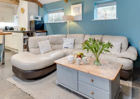 The Trefanny Inn, Trefanny Hill is a cosy one-bedroom barn conversion near Polperro and Looe, with original beams, a wood burner, sunny courtyard and private garden, ideal for couples seeking a tranquil Cornish countryside retreat for two.