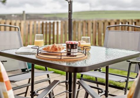 The patio, barbecue & alfresco dining area at The Wash House, Cannalidgey Farm, St Issey