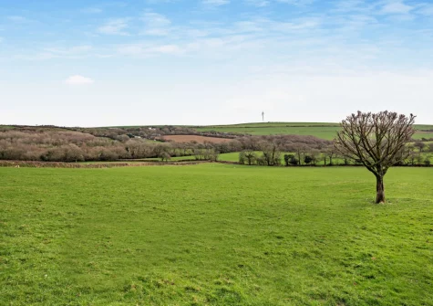 Enjoy rolling countryside views from the patio & alfresco dining area