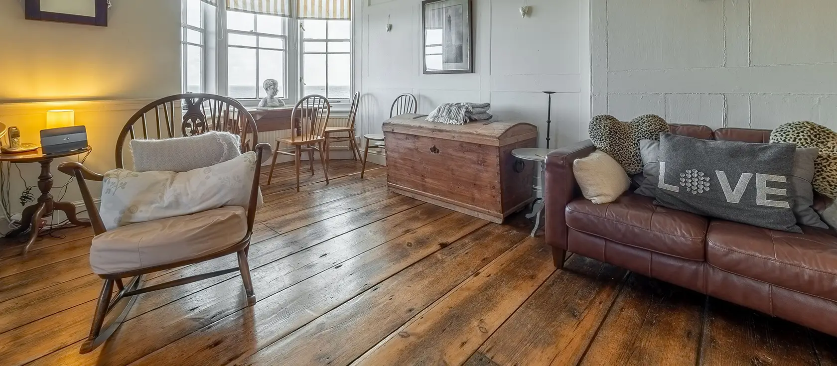 The Watch House, Coverack is a stunning 1810 coastal retreat for six guests. Enjoy spectacular headland views, cosy wood burner, private sea-view gardens, beach access, and authentic period charm, perfect for unforgettable family holidays.