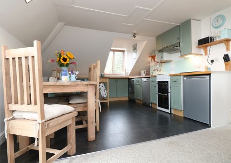 The open-plan kitchen & dining area at The Watch, Porthcurno