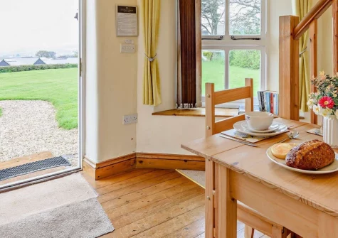 The Watchtower, Bickington is a charming grade II listed couples retreat perched high above the River Taw. Enjoy intimate open-plan interiors, sweeping valley views, and easy access to North Devon's glorious beaches and local attractions.