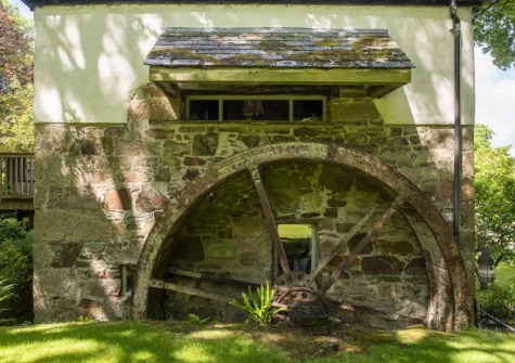 The Watermill retains many of its original features, including the characterful waterwheel to the side of the cottage