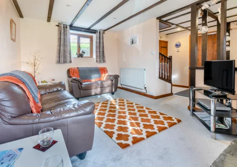 The living room at Thistledown Cottage, Poughill