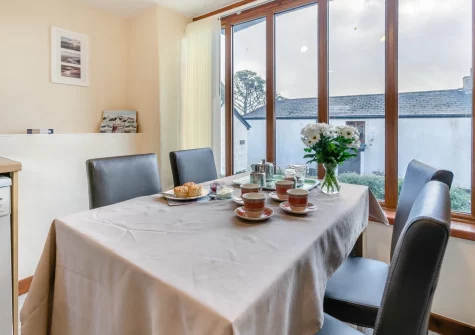 The dining area at Thistledown Cottage, Poughill