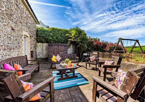 The patio & outdoor sitting area at Thornewidger Barn, Stibb Cross