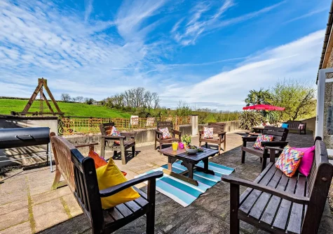 The patio & outdoor sitting area at Thornewidger Barn, Stibb Cross