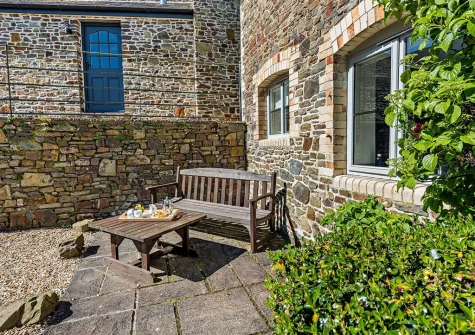 The front patio & outdoor sitting area at Thornewidger Barn, Stibb Cross