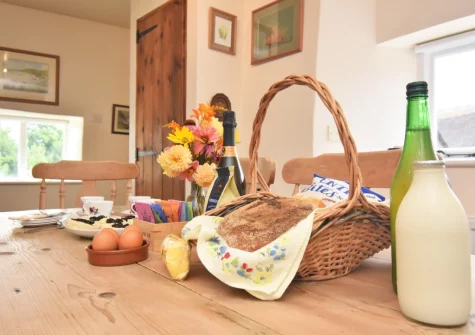 The dining area at Three Hares Cottage, Throwleigh