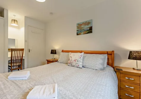 Bedroom #1 at Threshing, Fox Valley Cottages, Trenewan