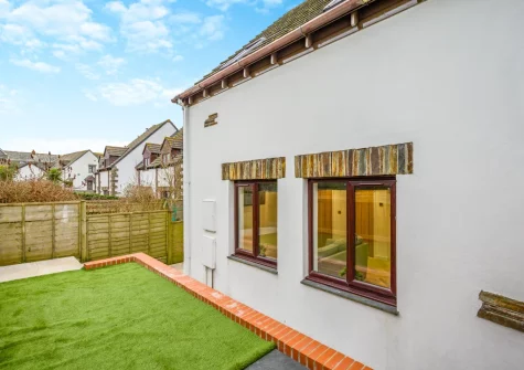 The patio with faux lawn at Tide and Seek, Padstow
