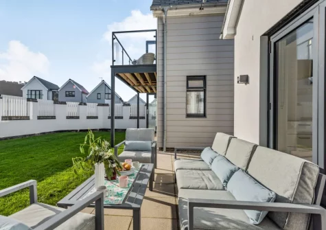 The patio, outdoor sitting area & enclosed gaden at Tides 45, Westward Ho!