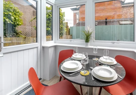 The conservatory dining area at Tides Cottage, Padstow