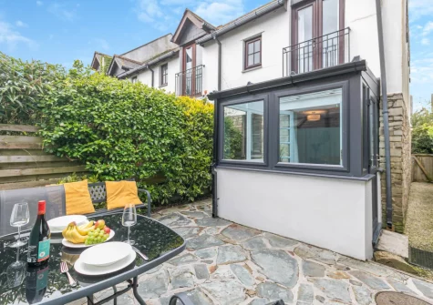 The rear patio garden & outdoor sitting area at Tides Cottage, Padstow
