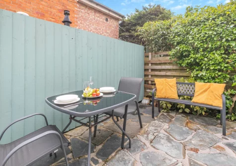 The rear patio garden & outdoor sitting area at Tides Cottage, Padstow