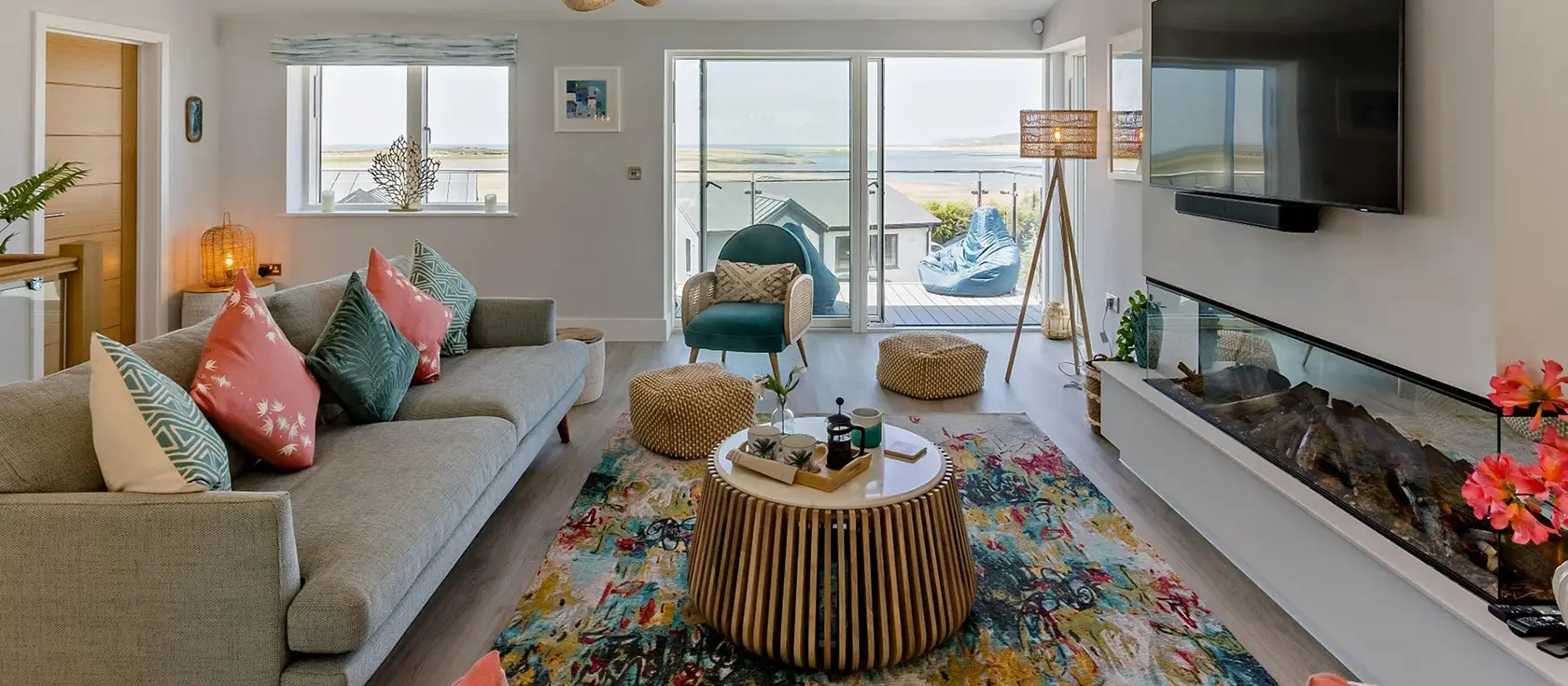 Tides View, Appledore is a luxurious four-bedroom coastal retreat featuring panoramic sea views, a private hot tub, and reverse-level design. Enjoy outdoor dining, a games room, and stunning balcony spaces perfect for memorable family holidays.