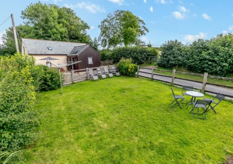 The enclosed garden lawn at Tillislow Barn, Virginstow