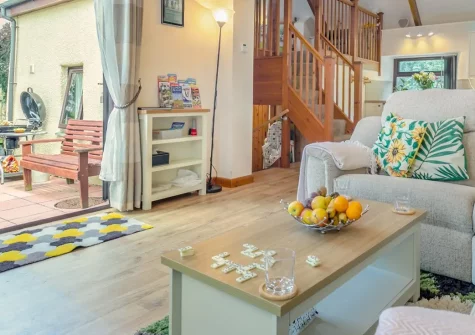 Tillislow Barn, Virginstow is a charming barn conversion on a peaceful 350-acre farm, offering countryside tranquility and easy access to Devon and Cornwall's finest attractions. Perfect for families seeking a traditional rural retreat.