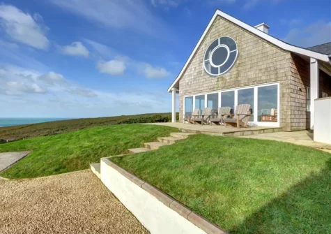 The patio, outdoor sitting area & garden at Tonga, Porthtowan
