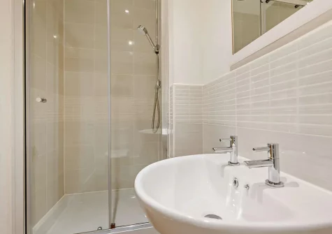 Bedroom #3 en-suite shower room at Top Mast, Charlestown