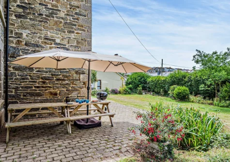 The patio, barbecue alfresco dining area & gaden at Torre Vean Manor, Porthleven