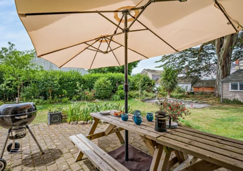 The patio, barbecue alfresco dining area & gaden at Torre Vean Manor, Porthleven