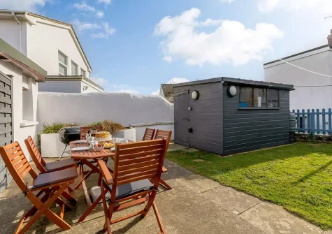 The rear patio, barbecue, alfresco dining area & garden at Torridge House, Instow