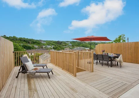 The decked terrace, outdoor sitting & alfresco dining area at Tralee, Portreath