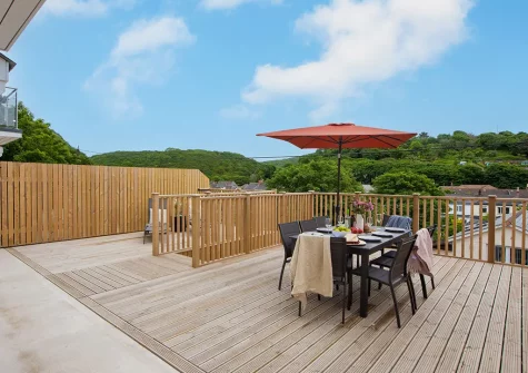 The decked terrace & alfresco dining area at Tralee, Portreath