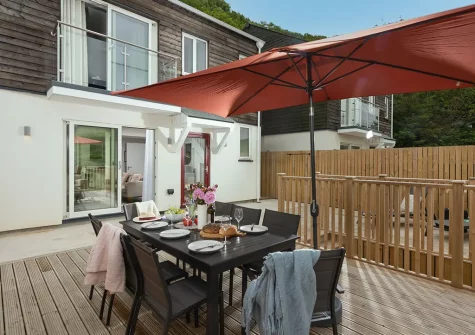 The decked terrace & alfresco dining area at Tralee, Portreath
