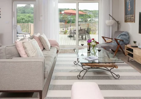 Tralee, Portreath is a stylish three-bedroom coastal house offering contemporary comforts and charming touches. Enjoy a private balcony with village views, generous decked terrace with barbecue, and just steps from Portreath Beach and coast path.