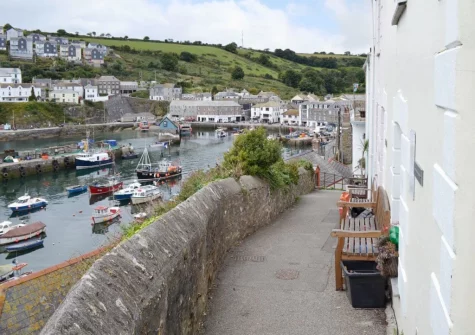 Tranquility is set above the working fishing harbour of Mevagissey & directly on the South West Coastal Pat