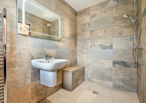 Bedroom #1 en-suite shower room at Trebudannon Barn, Trebudannon