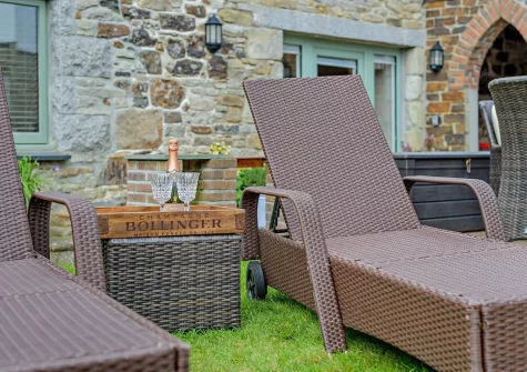 The garden & outdoor sitting area at Trebudannon Barn, Trebudannon