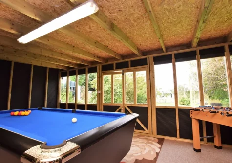 The shared games room at Trebudannon Barn, Trebudannon
